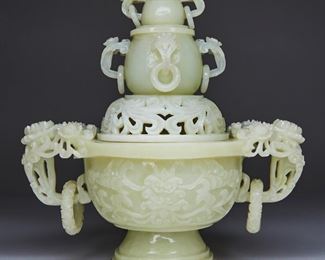 LOT 281: 20TH C. CHINESE CARVED JADE LIDDED VASE