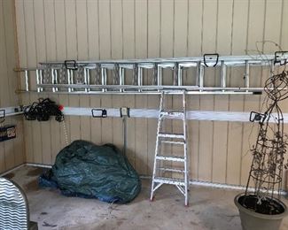 Multiple high reaching ladders. Various sizes 