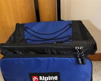 Soft pac ice chest on rollers with and extended handle