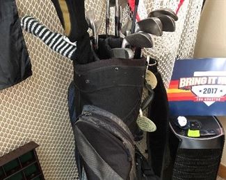 Assorted golf clubs