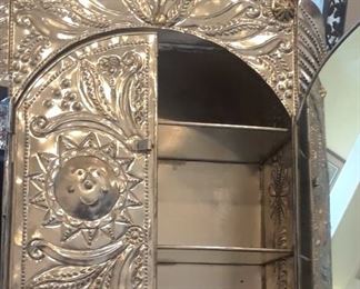 Large Mexican tin nicho with mirored doors.