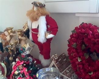 "Bubba" Santa . Rose heart wreath shown at right.