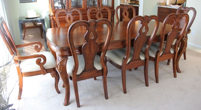 #1    $800.00. Dining table 8 chairs 2 leaves  Photo doesn’t include 2nd leaf it was found after photographed Table 30"h X 84"w X 44" this is with one 12" leaf in  