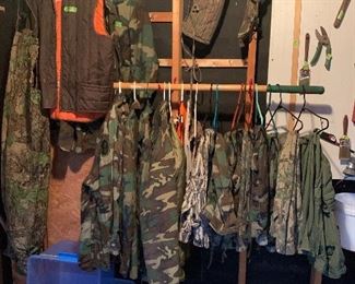 Lots of camouflage hunting clothes