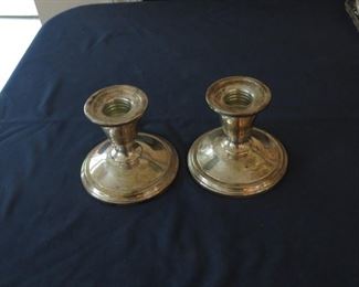 WEIGHTED STERLING CANDLE STICKS.