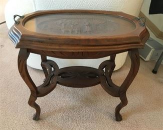 carved serving tray table