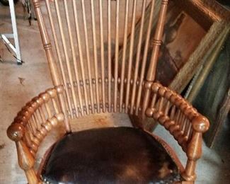 What a unique antique rocking chair. We have never seen anything like it in the past.