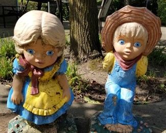 Boy and girl garden statues