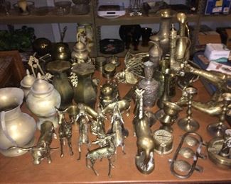 collection of solid brass items (planters, urns, cricket/potpourri boxes, ice tongs, vases, candle sticks)