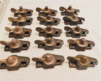 Set of 15 antique eagle claw window latches with brass knobs...catches not pictured