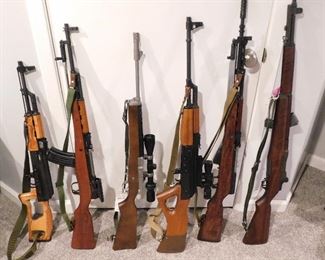 From Left: Romanian AK74, Chinese SKS Type 56, Sturm Ruger Ranch Rifle, Norinco AK47, Yugo Model 59/66, 1943 Springfield M1 Garand. More firearms and ammo available at the sale.