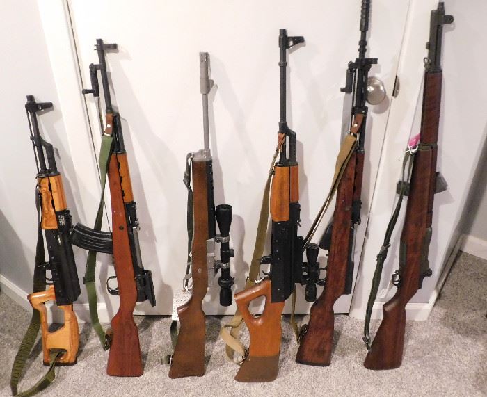 From Left: Romanian AK74, Chinese SKS Type 56, Sturm Ruger Ranch Rifle, Norinco AK47, Yugo Model 59/66, 1943 Springfield M1 Garand. More firearms and ammo available at the sale.
