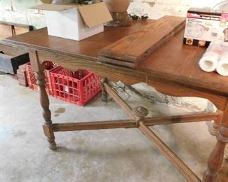 Antique table with 2 leaves. Antique tool chest with tools.