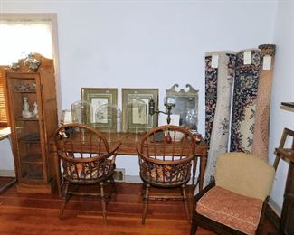 Narrow oak display cabinet(16 x 64 x 12). Vintage console table. Two Windsor style chairs:HAVE BEEN REMOVED BY THE FAMILY. One room size braided rug and 2 woven rugs.