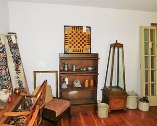 Antique game board, pewter pieces, pair of wall sconces from the C B & Q railroad, S.P. & S. Co. White Hall IL,crocks, trapezoidal display case, pair of antique French doors. 