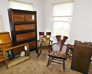 4 stack barrister. Arts and Crafts oak rocker. Spindle back rocker. Antique mirrors, old trunk.