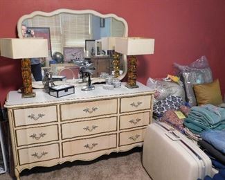 Vintage dresser with mirror. Vintage hair dryer with stand. Pair of vintage glass-block lamps. Nice old Samsonite suitcase.