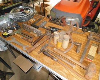 Old tools, beat up hubcaps, etc.