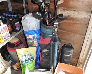 Golf clubs with bag, Shagster ball retriever, golf balls, lots of 10W-30 motor oil, nice oversized bag chair.