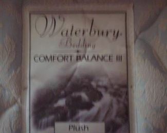 Bedroom #3:  The PLUSH king mattress set is by WATERBURY, a Comfort Balance III.  It is a single mattress (not two twins).