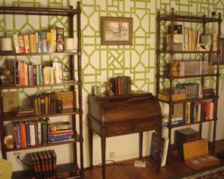 Family Room:  Two individually priced open display cabinets showcase numerous books, bookends, and DVDs.  Each unit measures 34" wide x 13" deep x 80" tall to finial tops.  They flank a newer roll-top desk which is shown closed in this photo but open in the next photo.