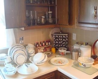 Kitchen:  The blue & white CORNING/CORELLE  includes 12 dinner plates; 12 salad plates; 8 dessert plates; 6 saucers; 12 cups (two different styles); 8 cereal bowls; 8 smaller bowls; 3 round serving bowls; 1 oval bowl; 1 oblong platter; 1 covered butter; 1 creamer; and 1 sugar.  It is NOT priced as a set though; rather, it is priced out:  12 dinner plates for $XX; 3 bowls for $XX, so that you can purchase just what you need or complete your current set.