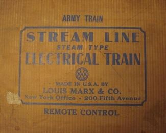 Near Cashier:  A vintage (circa 1940) "ARMY Train - Stream Line - Steam Type - Electrical Train by LOUIS MARX" is in its original box.  Closer photos follow.