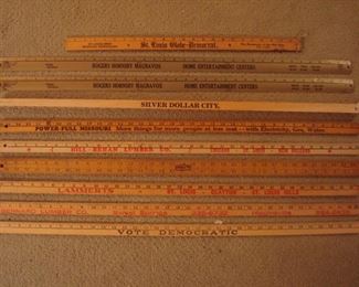 Lower Level-Tool Room:  Numerous advertising yard sticks.  Each one is priced.