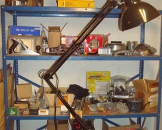 Lower Level-Tool Room:  Lots of hand tools and hardware are behind the clamp-on lamp.