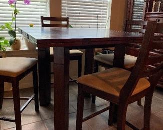 table w/ 6 chairs.  Square table turns in round table 