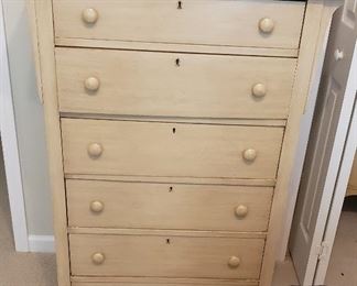 cream color chest of drawers