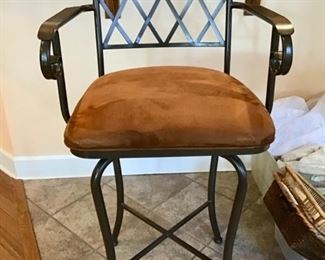 We have 2 of these.   Wrought Iron Swivel Bar Stools