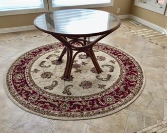 Round Bamboo Table, and another one of the very nice round area rugs