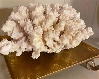 Coral on a gold colored base