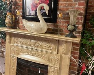 Cast iron and wood mantel