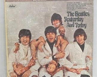 1043 1043	THE BEATLES YESTERDAY & TODAY WITH ORIGINAL *BUTCHER* COVER CAPITOL RECORDS STEREO ST 2553. THERE IS SOME SCUFFS ON COVER INDICATING THAT THE REPLACEMENT COVER STICKER WAS REMOVED. 
