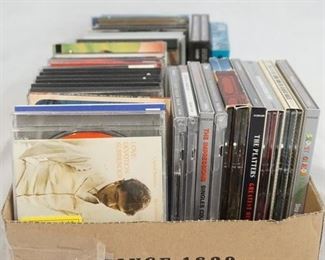 1196	LOT OF CDS VARIOUS BANDS/ARTISTS INCLUDING; THE PLATTERS, SMOKEY ROBINSON, DUANE EDDY, BIG JOE TURNER, SAM COOKE, HOWLIN WOLF, RAW DELTA BLUES, B.B. KING, THE WHO, GENE PITNEY, BUDDY HOLLY, CHRIS CONNER, BRITISH INVASION MASTERS, SLY STONE & MORE!

