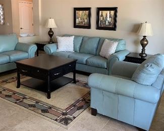 Ashley Leather Sofa, Loveseat and 2 Arm Chairs, Coffee Table w 4 Drawers and 4 Pullouts, End Tables pr, Table Lamps, pr, Area Rug, Art pair, Decorative Pillows pr