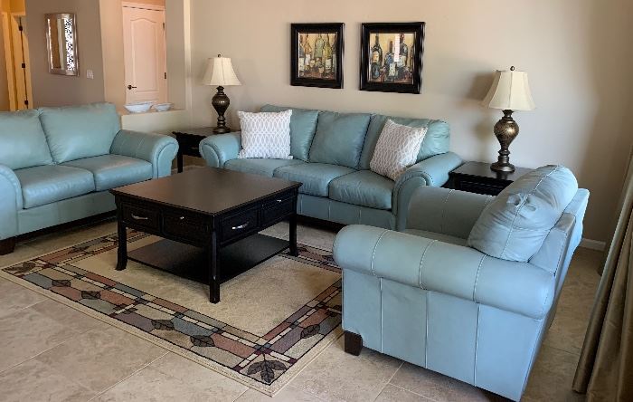 Ashley Leather Sofa, Loveseat and 2 Arm Chairs, Coffee Table w 4 Drawers and 4 Pullouts, End Tables pr, Table Lamps, pr, Area Rug, Art pair, Decorative Pillows pr