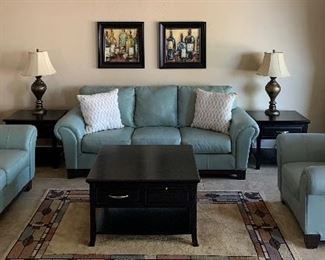 Ashley Leather Sofa, Loveseat and 2 Arm Chairs, Coffee Table w 4 Drawers and 4 Pullouts, End Tables pr, Table Lamps, pr, Area Rug, Art pair, Decorative Pillows pr