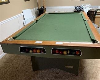 Vintage Championship home billiard table.  Prime condition with new felt padding.  Comes complete with cues and stand, balls and cover.  Great Price !!
