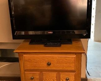 Oak nightstand with 32" Visio TV on top