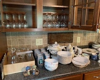 2 sets of quality wine glasses, covered tureen,  collection of S&P shakers and many other items.