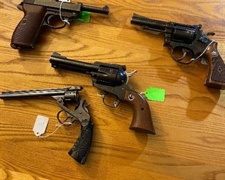top left P38, top right Smith & Wesson model 18, center Ruger Black hawk 357 cal., bottom H&R 22 cal. (needs repair)