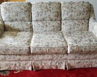 Upholstered floral sofa