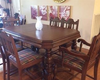 1940's Dining Table with hidden leaf under the table and 8 chairs (yes, there are 2 more  chairs not pictured).