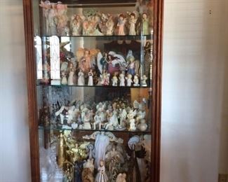 Huge display case filled with angel collectibles!