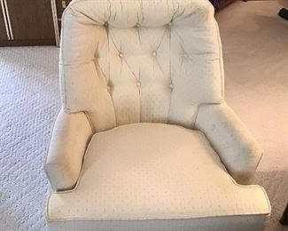 White arm chair - great for a cabin or college student.