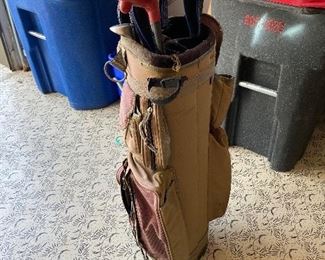 Set of vintage golf clubs and bag