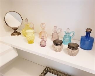 Fenton Hobnail Vaseline glass,  $20 Yellow  with stopper, $10 Yellow vase, $10 Blue with stopper, $10 light pink with stopper.  $6 ea.  small purple with stopper, clear jars with zinc lid